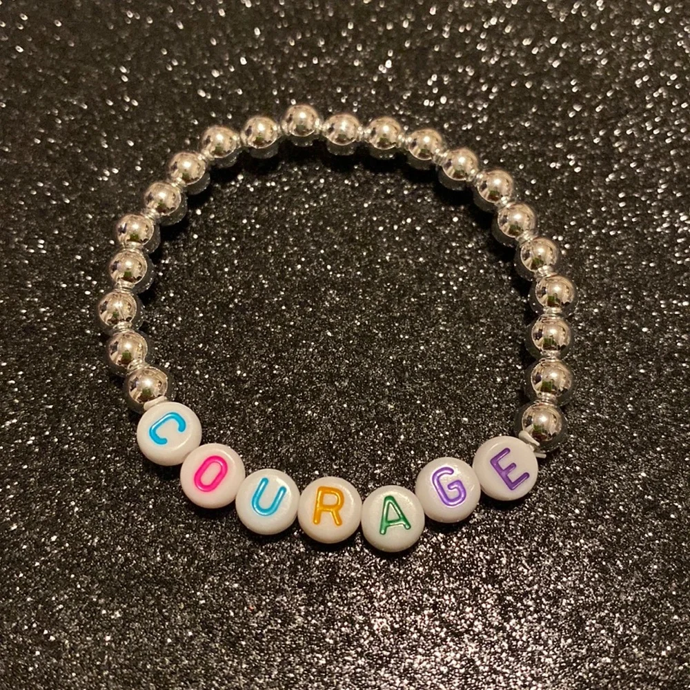 Girls faux silver beaded stretch courage bracelet